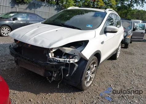 2013 Ford Escape Titanium z USA, uszkodzony, nr VIN 1FMCU9J92DUA57927